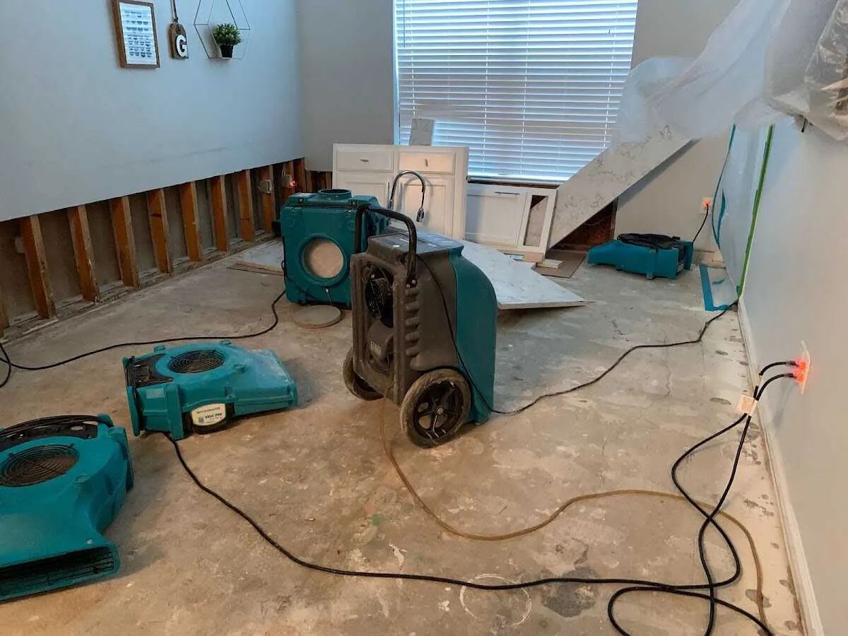 Dehumidifier in flood-cut room for Water Damage Restoration in East Troy